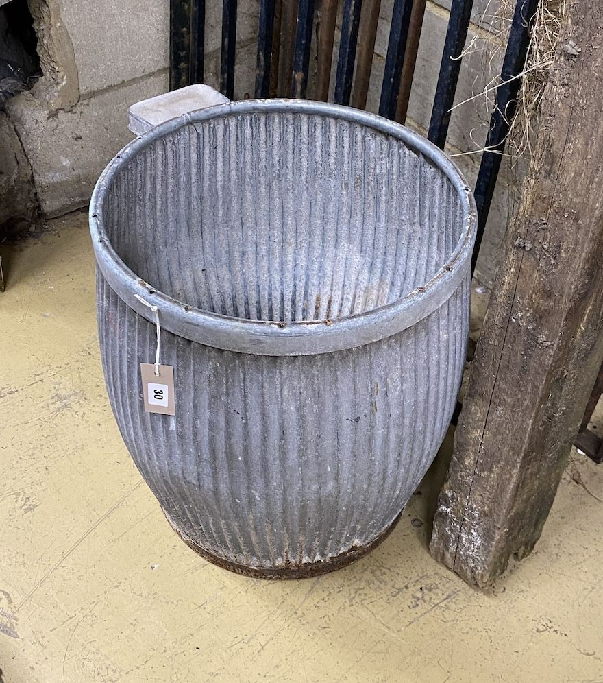 A circular galvanised grain bin, height 53cm
